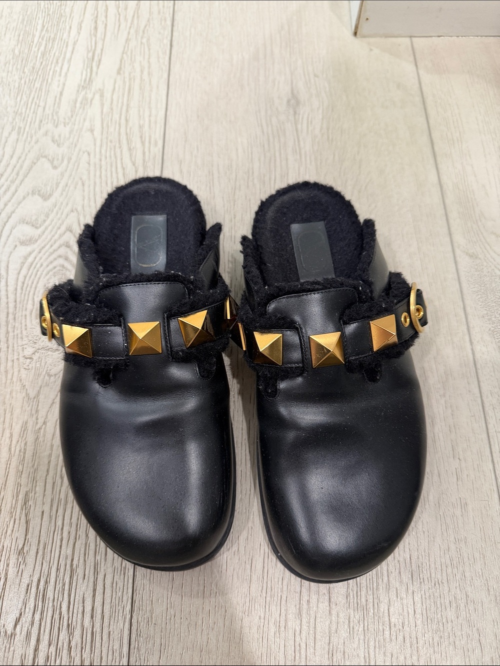 Valentino Black womens Slip-On Clogs with Gold Pyramid Studs
